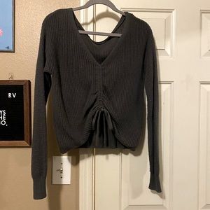 deep gray HOLLISTER sweater with cinched detail on the front